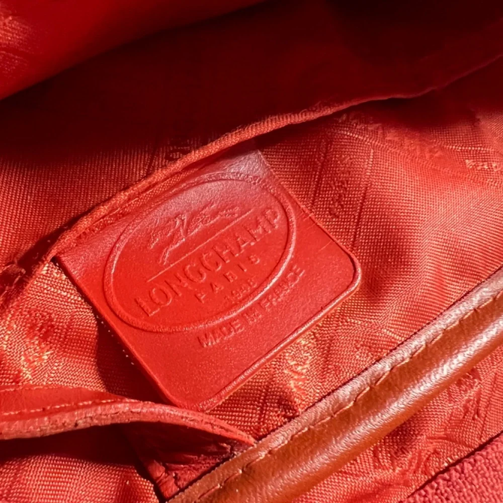 Longchamp handbag - Striking orange pebbled leather. - Picture 9 of 9